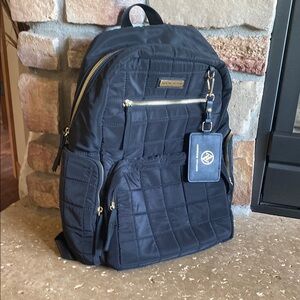 Adrienne Vittadini Black and Gold Backpack with Quilted Design Excellent cond.